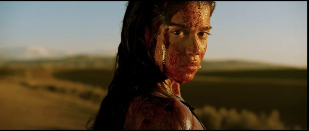 Jen displaying her strength in Revenge