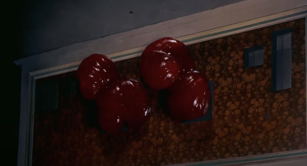 The blob attacks a movie theatre.