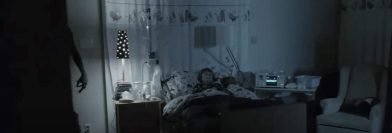 Dalton in bed with the demon lurking in Insidious