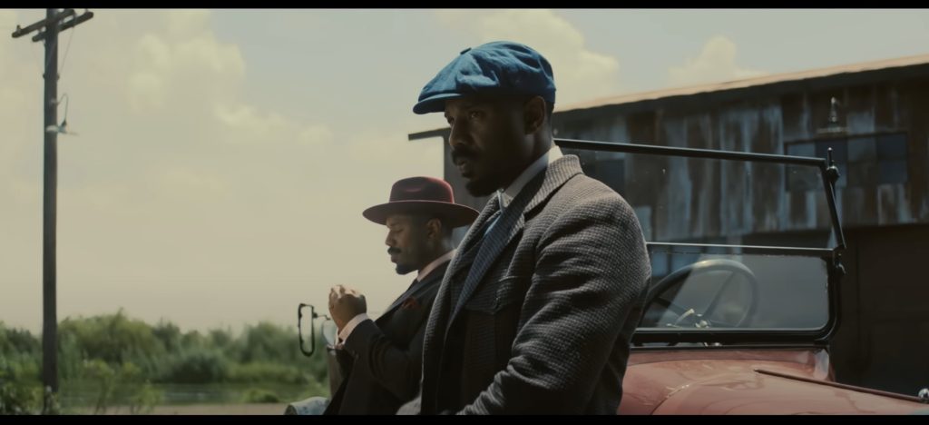 Micheal B Jordan as Smoke and Stack in Sinners.