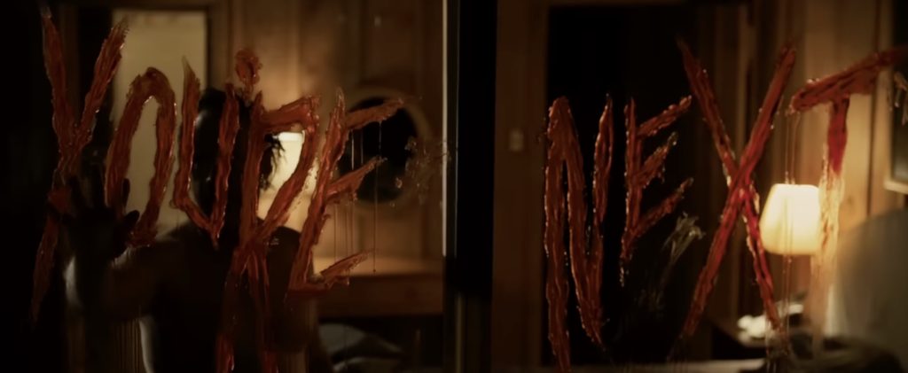 the killers warning from You're next a home invasion Neo-slasher