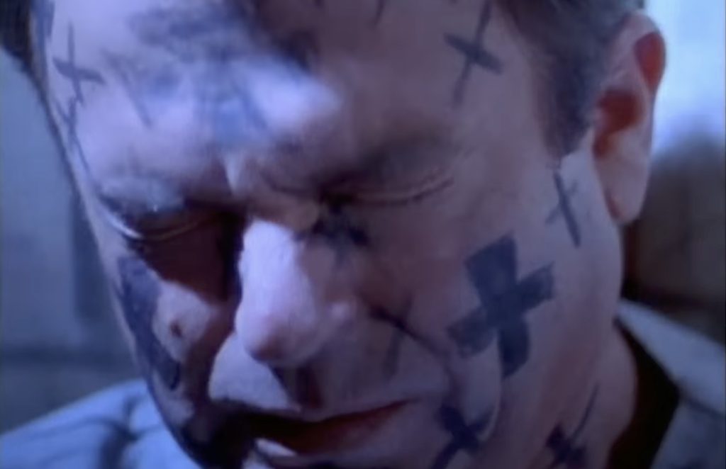 Sam Neill slowly goes insane in InThe Mouth of MAdness